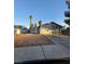 Charming single-story home featuring a low-maintenance gravel yard and attached two-car garage at 5615 Blue Sea St, Las Vegas, NV 89110