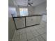 Kitchen island featuring white cabinets and a stainless steel sink at 5615 Blue Sea St, Las Vegas, NV 89110