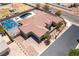 Sprawling property featuring a swimming pool, basketball court, solar panels, and manicured grounds at 5812 Shangri La Night Ct, Las Vegas, NV 89149