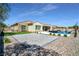 Backyard featuring a covered patio and gorgeous pool at 5812 Shangri La Night Ct, Las Vegas, NV 89149