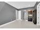 Spacious room with neutral walls, tile flooring, and recessed lighting, ready for personalized decor at 5812 Shangri La Night Ct, Las Vegas, NV 89149