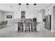 Modern kitchen with stainless steel appliances, a center island, and elegant pendant lighting at 5812 Shangri La Night Ct, Las Vegas, NV 89149