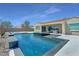 Backyard oasis featuring a luxurious pool and spa combo at 5812 Shangri La Night Ct, Las Vegas, NV 89149