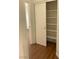 Hallway closet featuring built-in shelves at 6470 Shining Sand Ave, Las Vegas, NV 89142