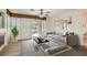 Cozy living room showcasing a fireplace, comfortable seating, and access to the backyard pool at 697 Gull Point Ave, Las Vegas, NV 89123