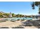 Outdoor pool area with plenty of lounge chairs and umbrellas for residents to enjoy at 701 Webber Park St, Henderson, NV 89011