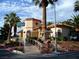 Beautiful community center with desert landscaping, palm trees, and a welcoming entrance at 7273 Vista Bonita Dr, Las Vegas, NV 89149