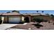 Charming single-story home featuring a tile roof, two-car garage, and mature landscaping at 7273 Vista Bonita Dr, Las Vegas, NV 89149