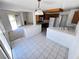 Bright kitchen featuring tile countertops, modern appliances, and an open layout at 7273 Vista Bonita Dr, Las Vegas, NV 89149