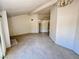 Spacious living room features high ceilings, lots of light, and neutral carpet at 7273 Vista Bonita Dr, Las Vegas, NV 89149