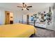 Cozy bedroom featuring soft carpet and natural light along with stylish wall art at 7702 Wishbone Falls St, North Las Vegas, NV 89084