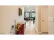 Inviting hallway leads to the living area, providing a glimpse of the open floor plan and natural light at 7702 Wishbone Falls St, North Las Vegas, NV 89084
