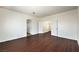 Spacious living room featuring stylish flooring and easy access to other rooms at 7977 Blue Brook Dr, Las Vegas, NV 89147