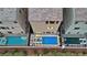Aerial view of several homes highlighting modern backyards, some with pools and spas at 8055 Haywood Estate Ave, Las Vegas, NV 89113