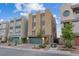 Stylish townhome with desert landscaping, a modern design, and rooftop access at 8055 Haywood Estate Ave, Las Vegas, NV 89113