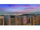 Modern townhouse showcasing a rooftop patio, balconies, and contemporary design with downtown views at 8055 Haywood Estate Ave, Las Vegas, NV 89113