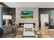 Inviting living room boasts a modern fireplace with decorative tile surround and stylish furnishings at 8055 Haywood Estate Ave, Las Vegas, NV 89113