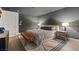 Chic bedroom featuring a king size bed, ensuite bathroom and recessed lighting at 8055 Haywood Estate Ave, Las Vegas, NV 89113
