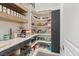 Organized walk-in pantry with ample shelving and storage space for food and kitchen essentials at 8055 Haywood Estate Ave, Las Vegas, NV 89113