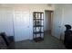 Bedroom featuring large closets, convenient access to other rooms, and neutral decor at 8131 Skye Plum St, Las Vegas, NV 89166