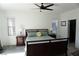 Bedroom with comfortable bed, ceiling fan, carpet, and natural light at 8131 Skye Plum St, Las Vegas, NV 89166