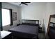 Comfortable main bedroom with ample natural light, featuring a queen bed and stylish decor at 8131 Skye Plum St, Las Vegas, NV 89166