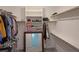 Well-organized walk-in closet with ample storage space and shelves at 8131 Skye Plum St, Las Vegas, NV 89166