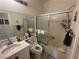 Bathroom with modern shower and vanity with sink and toilet at 8337 Ruby Heights Ave, Las Vegas, NV 89117