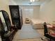 Cozy bedroom featuring a bed, wardrobe, vanity and a neutral color palette at 8337 Ruby Heights Ave, Las Vegas, NV 89117