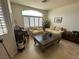 Cozy living room featuring comfortable seating, stylish decor, and ample natural light at 8337 Ruby Heights Ave, Las Vegas, NV 89117