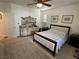 Inviting main bedroom showcasing a queen bed, carpet floors, and an ornate dresser, offering a relaxing and stylish space at 8337 Ruby Heights Ave, Las Vegas, NV 89117
