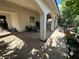 Inviting covered patio featuring tiled flooring and landscaped garden views at 8337 Ruby Heights Ave, Las Vegas, NV 89117