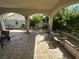Serene outdoor patio surrounded by lush greenery and seating at 8337 Ruby Heights Ave, Las Vegas, NV 89117