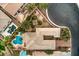 An aerial of a meticulously landscaped property with a sparkling pool and private outdoor space at 8633 Kennedy Heights Ct, Las Vegas, NV 89131