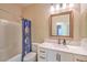 Bathroom with vanity, bathtub, shower and marble-like countertops at 8633 Kennedy Heights Ct, Las Vegas, NV 89131