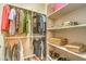 Organized closet with shelving and hanging space for clothes and accessories at 8633 Kennedy Heights Ct, Las Vegas, NV 89131