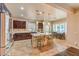 Bright kitchen featuring a center island, stainless steel appliances, and a cozy breakfast nook at 8633 Kennedy Heights Ct, Las Vegas, NV 89131