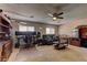 Spacious bonus room with ceiling fan, carpet and windows at 9091 Jumping Jacks Ave, Las Vegas, NV 89178