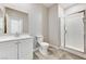 Bright bathroom with tiled shower, modern fixtures, and a sleek vanity at 934 Twincrest Ave, North Las Vegas, NV 89032