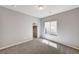 Bedroom with closet and window, featuring neutral walls and carpeted floors at 934 Twincrest Ave, North Las Vegas, NV 89032