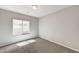 Cozy bedroom with neutral carpet, a window, and ample natural light at 934 Twincrest Ave, North Las Vegas, NV 89032