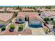 An aerial view of the home's exterior with a terracotta roof and desert landscaping at 9813 Folsom Dr, Las Vegas, NV 89134