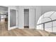 Bedroom featuring sleek floors, closet, and modern design at 10200 Wood Work Ln, Las Vegas, NV 89135