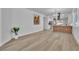 Open-concept living space featuring modern design, sleek floors, and natural light at 10200 Wood Work Ln, Las Vegas, NV 89135