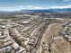 This high-altitude shot reveals the neighborhood's layout, with homes nestled amid desert landscape and trails at 10205 Birch Bluff Ln, Las Vegas, NV 89145