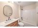 Bathroom with vanity, black fixtures and combined shower and bathtub at 10205 Birch Bluff Ln, Las Vegas, NV 89145