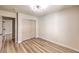 Spacious bedroom features new flooring, a closet, and modern lighting at 10205 Birch Bluff Ln, Las Vegas, NV 89145