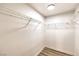 Walk-in closet with built-in shelving and ample storage space at 10205 Birch Bluff Ln, Las Vegas, NV 89145