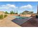 Stunning backyard pool and spa area with ample space for relaxation and recreation at 10302 Artful Stone Ave, Las Vegas, NV 89149