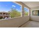 Beautiful balcony with a view of nearby trees and houses at 10368 Mystic Pine Rd, Las Vegas, NV 89135